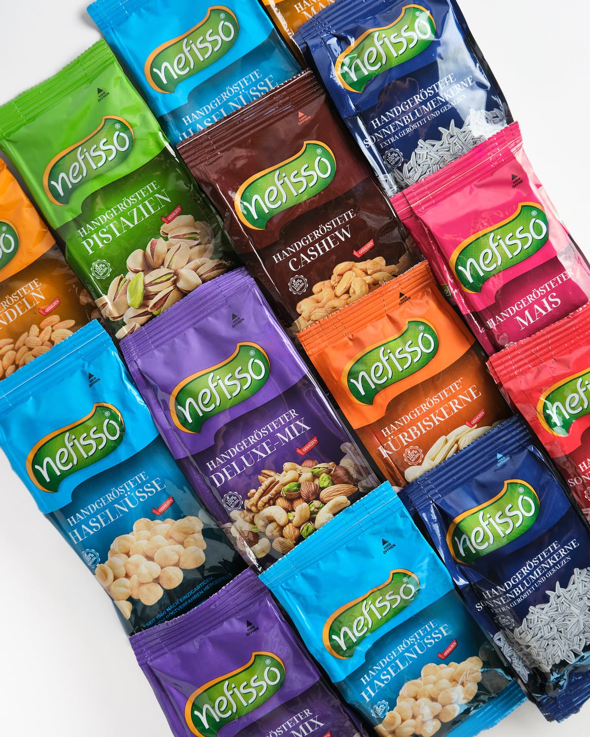 Colourful Nefisso snack bags arranged on a light background